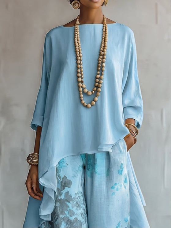 Ensemble Top Asymétrique Bleu et Pantalon Floral à Jambes Larges
