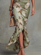 Silvia | Abito Maxi Asimmetrico in Satin Floreale Verde con Maniche a Campana