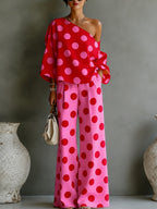 Ensemble deux pièces top décolleté asymétrique à pois roses rétro et pantalons larges