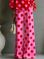 Ensemble deux pièces top décolleté asymétrique à pois roses rétro et pantalons larges