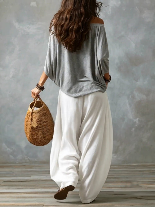 Bianca | Top Grigio Off-shoulder e Pantaloni Lantern Bianchi Svasati