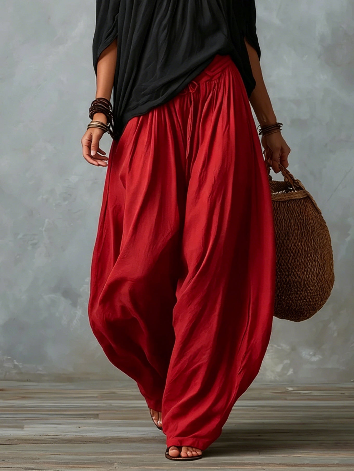 Elena | Top Nero Off-Shoulder e Pantaloni Lantern Rossi Svasati