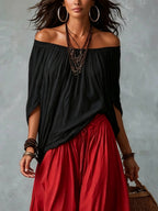 Haut Noir Off-Shoulder et Pantalon Lantern Rouge Ample